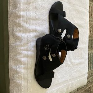 L47 black suede wedge sandal.